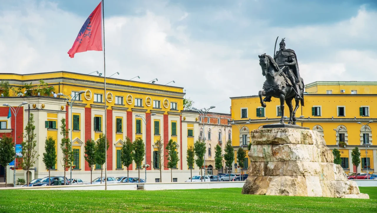 Skanderbeg Square in Tirana, Albania, featuring the statue of Skanderbeg and surrounding historic buildings