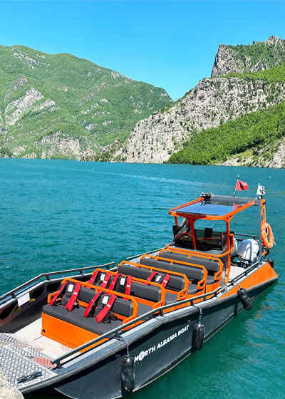 Boat docked on Koman Lake, North Albania