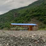 Main gathering tent at Berisha River campsite, perfect for group activities and relaxation.