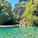 Shala River with transparent waters and big green mountains