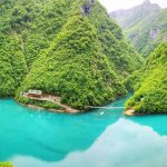 Shala River with blue waters and big green mountains