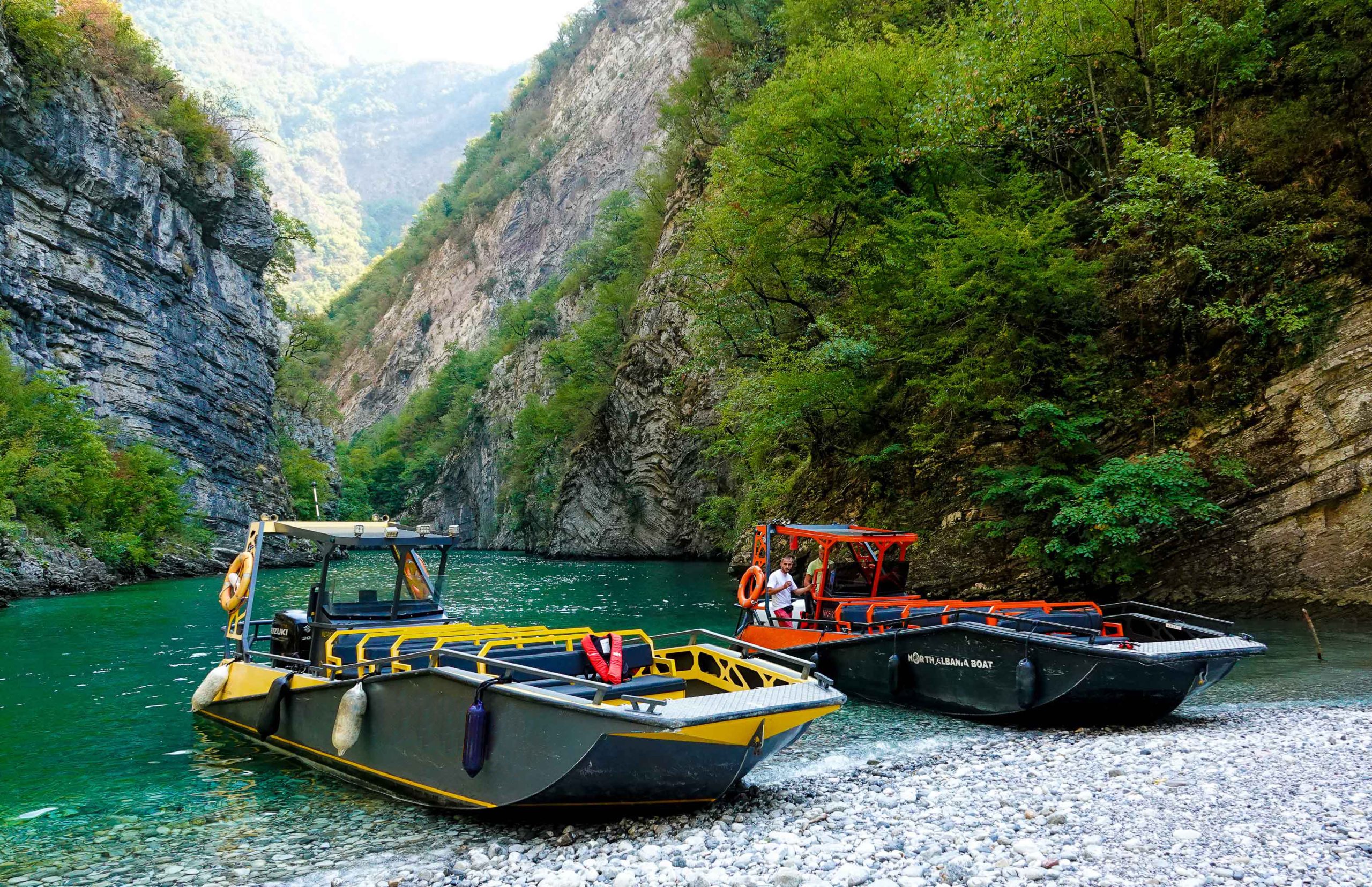 Two WaterMate LR9 Safari boats cruising on the scenic Koman Lake in North Albania