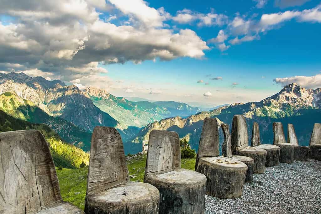 Albanian Alps viewpoint wooden carved benches mountain panorama limestone peaks northern Albania hiking trail