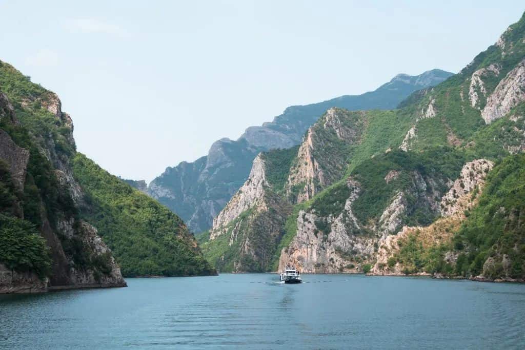 Komani Lake Albania wide canyon view turquoise water limestone cliffs boat tour Albanian Alps