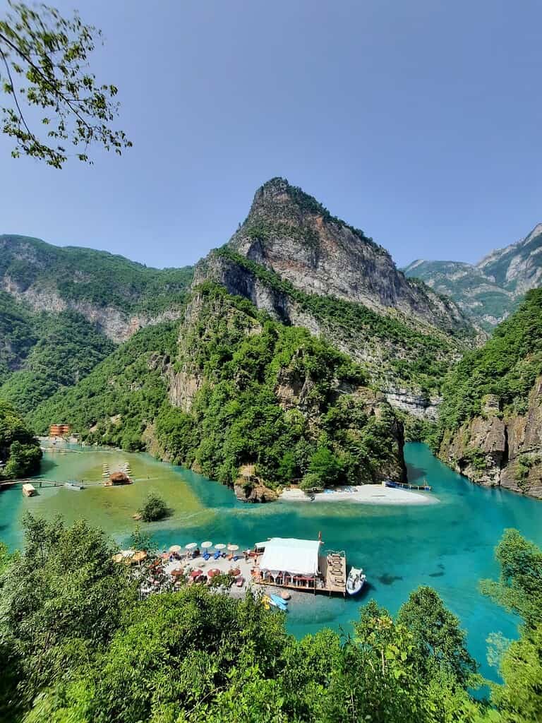 Shala River turquoise water surrounded by mountains in Albania